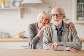 Life Assure Senior Wife Husband Posing In Kitchen Blog